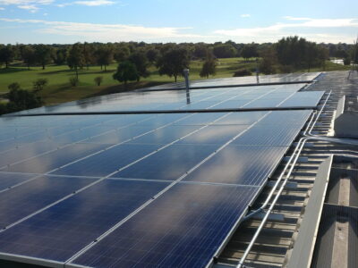 Commercial solar panels installed on metal warehouse