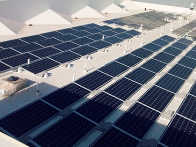 Ballasted commercial solar array on hotel roof
