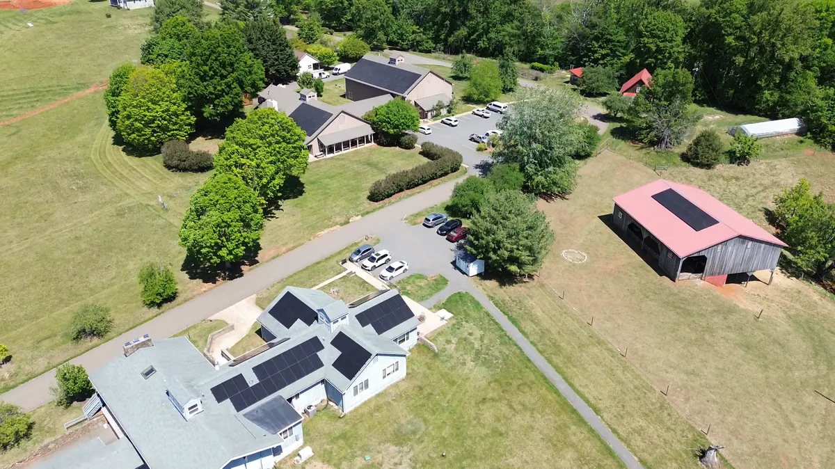 Aerial view of a multi-building campus with rooftop solar in Virginia