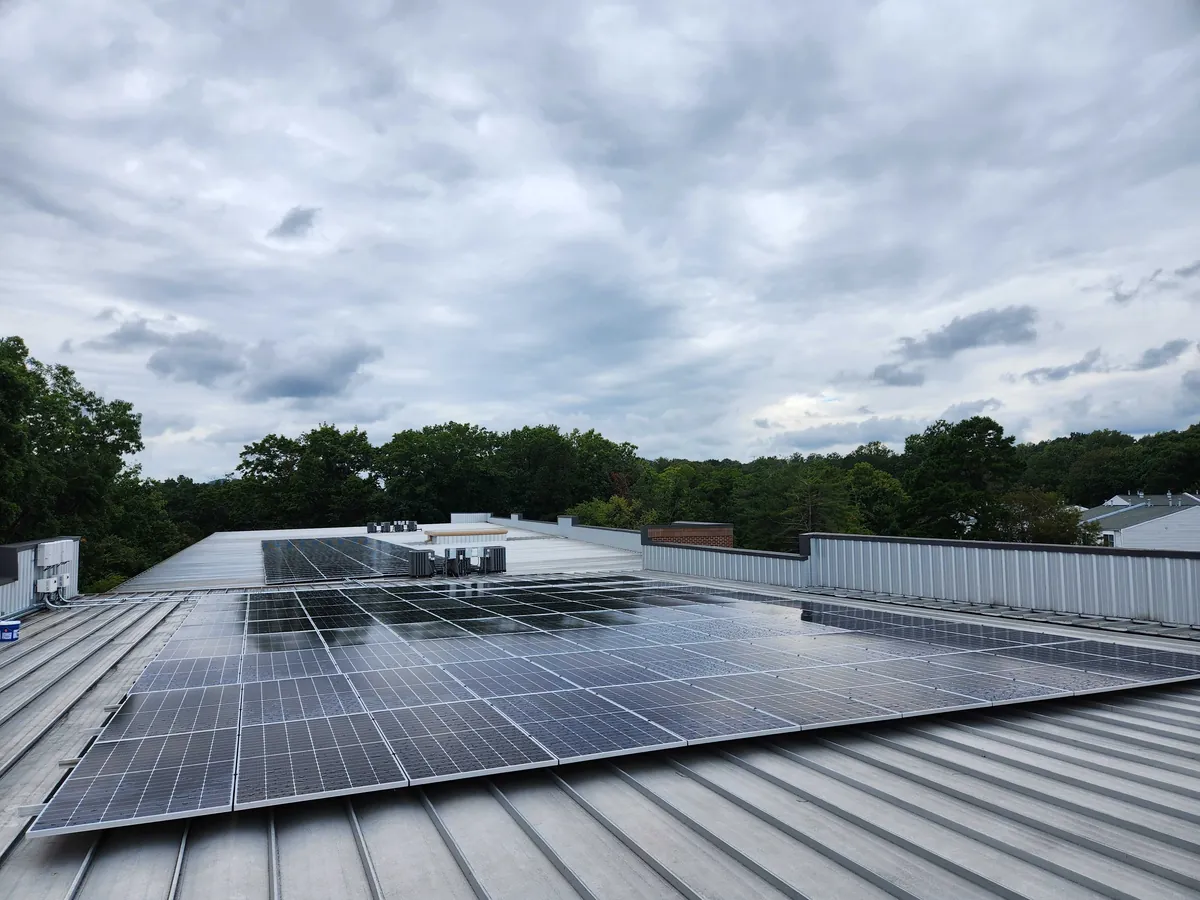 Commercial solar array on a standing-seam metal roof in Virginia