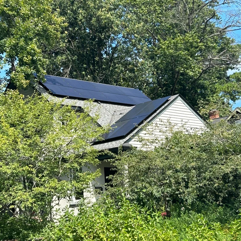 Additional solar panels added alongside an existing rooftop array on a Virginia home