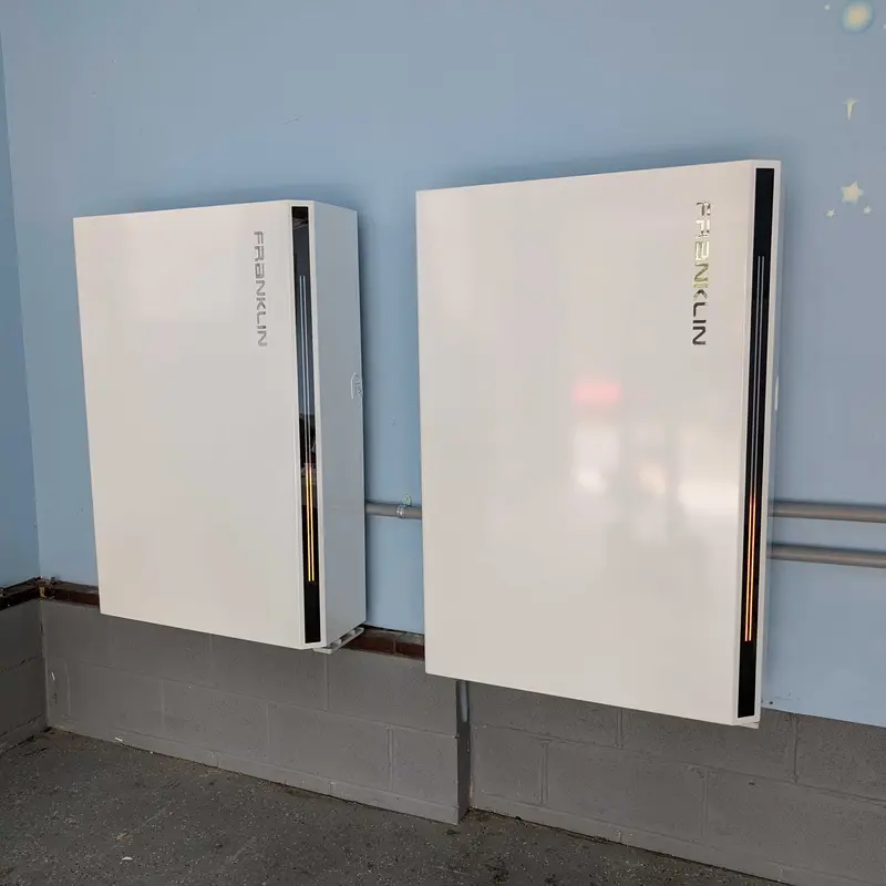 Two aPower 2 batteries installed on a wall