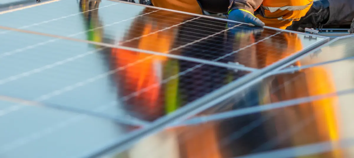 Servicing solar panels on roof