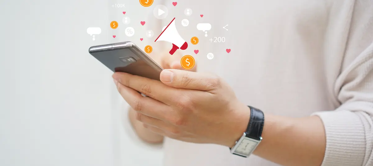 Person referring friend on phone