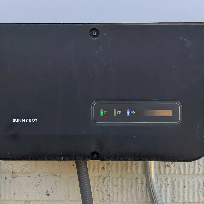 SMA Sunny Boy inverter with green operating light and blue communication light