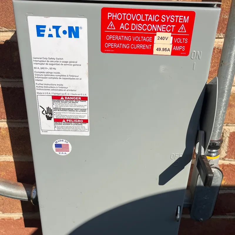 Photovoltaic system AC disconnect with the handle in the ON position